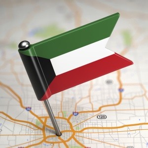 Kuwait Small Flag on a Map Background. 487227677